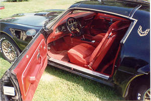 I redid the striping and painted the interior becauce it faded to pink. I put in new carpet, headliner, and had the 400 rebuilt. That was in 1994-5.