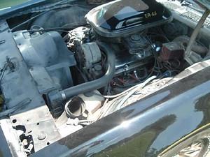 What my engine compartment looked like upon delivery.  Dirty after 26 years, but the W72 400 was all there and ready to run.