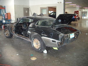 The only bad rust was on the lower rear fender.  They cut it off and welded new panel in place.
