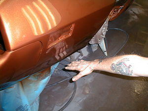 Look....I can shave in this....well at least Gary the painter can...check out his "Tats"